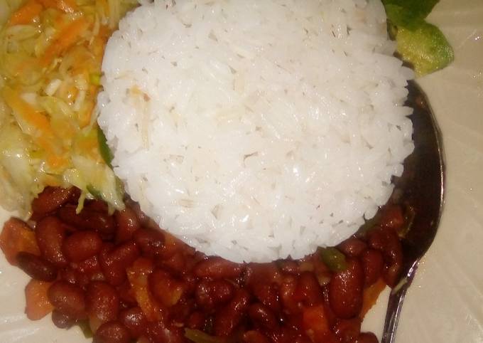 A picture of Beans stew with rice,cabbage.