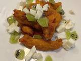 A picture of Tomato goujon with a mozzarella and kiwi salad.