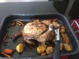 A picture of Roast chicken with vegetables.