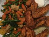 A picture of Baked Wings & Mix Vegetables.