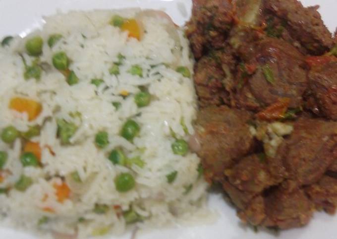 A picture of Vegetable rice with dry beef.