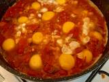 A picture of Shakshuka or (Tomato Eggs).