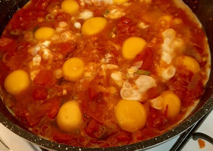 A picture of Shakshuka or (Tomato Eggs).