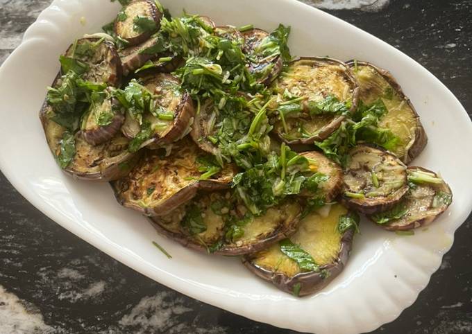 A picture of Grilled Eggplants with dressing.