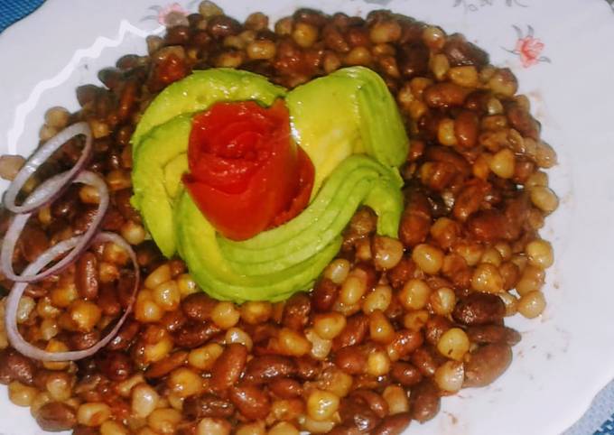 A picture of Chillie infused githeri with tomato rose and avocado rose.