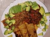 A picture of Traditional matumbo stew, served with chapati and cabbage.