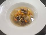 A picture of Simple mushroom and vegetable consommé.