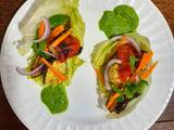 A picture of Grilled vegetable lettuce pockets.