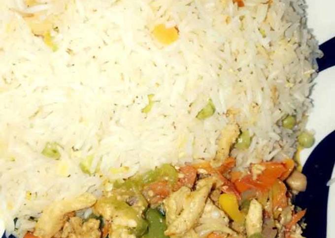 A picture of Rice and vegetable sauce.