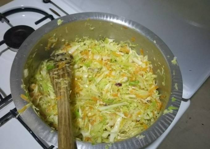 A picture of Steamed cabbage and carrot.