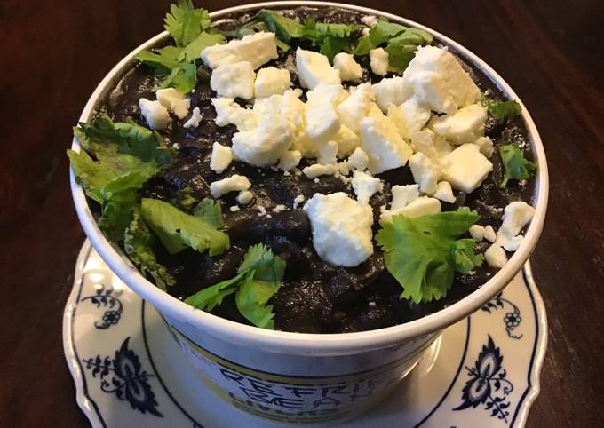 A picture of California Farm Refried Turtle Beans with Aquafaba Broth.