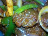 A picture of Gizzard sauce with vegetables.