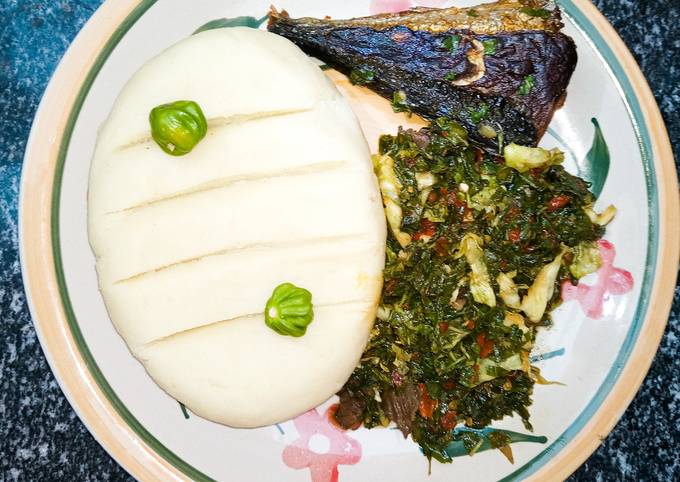 A picture of Pounded yam with vegetable sauce.