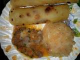 A picture of Carrot chapatis,steamed cabbage plus beef stew.