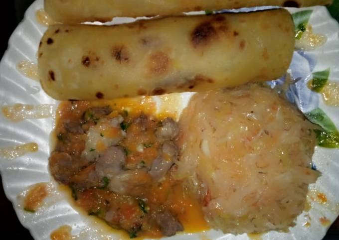 A picture of Carrot chapatis,steamed cabbage plus beef stew.