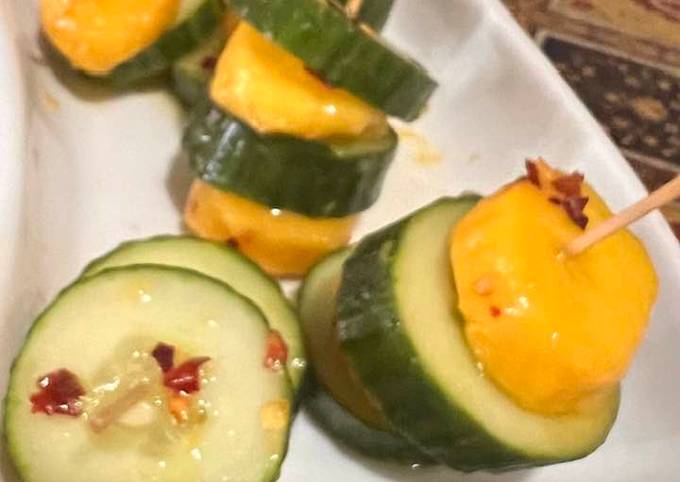 A picture of Mango-cucumber kabobs.