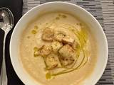 A picture of Creamy Cauliflower Soup with Rosemary Olive Oil.