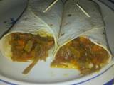 A picture of Tortilla with beef and vegetable sauce.