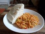 A picture of Ugali and spiced cabbage.