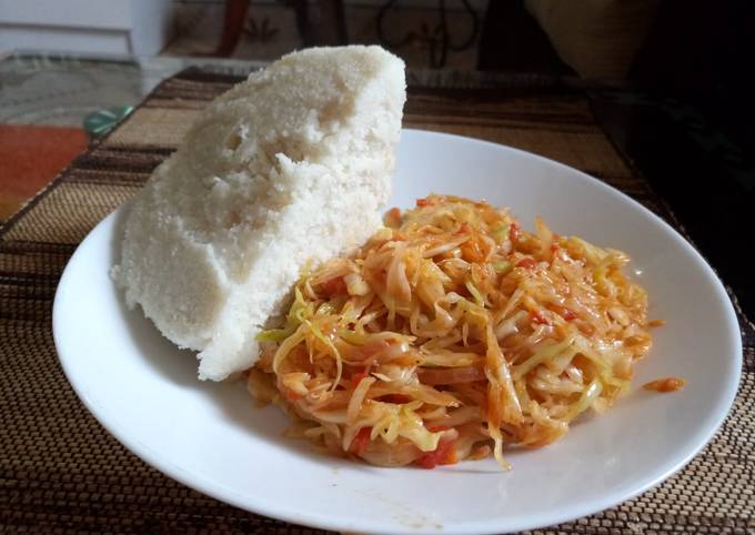 A picture of Ugali and spiced cabbage.