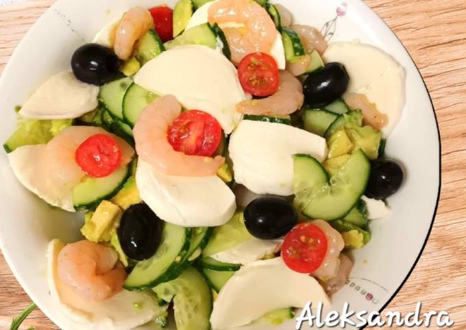 A picture of Cucumber Salad with Avocado, Shrimp and Mozzarella.