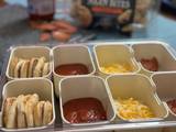 A picture of Snackle box pizza luncheables.