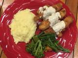 A picture of ParmFish fingers served with creamy mash and assorted vegetables.