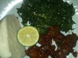 A picture of Fried beef and steamed sukuma wiki.