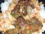 A picture of Rice with chilli beef and cabbage.