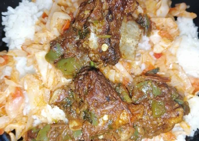 A picture of Rice with chilli beef and cabbage.