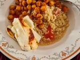 A picture of Honeyed hallloumi on Harissa Tabbouleh with chickpeas tomatoes and yoghurt.