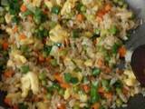 A picture of Fried rice with vegetables.