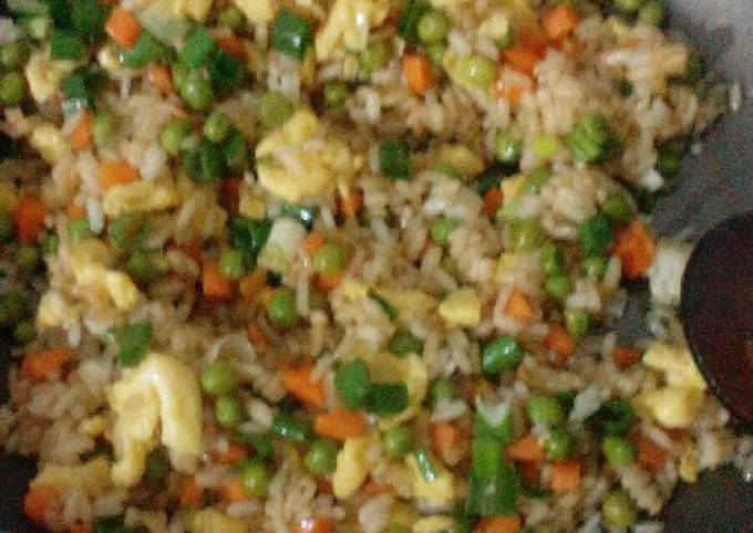 A picture of Fried rice with vegetables.