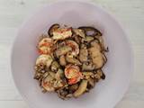 A picture of Sauteed Mushroom with prawns.