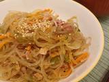 A picture of Japchae - Korean vermicelli with meat and vegetables.