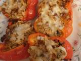 A picture of Air Fryer Chicken and rice stuffed bell peppers.