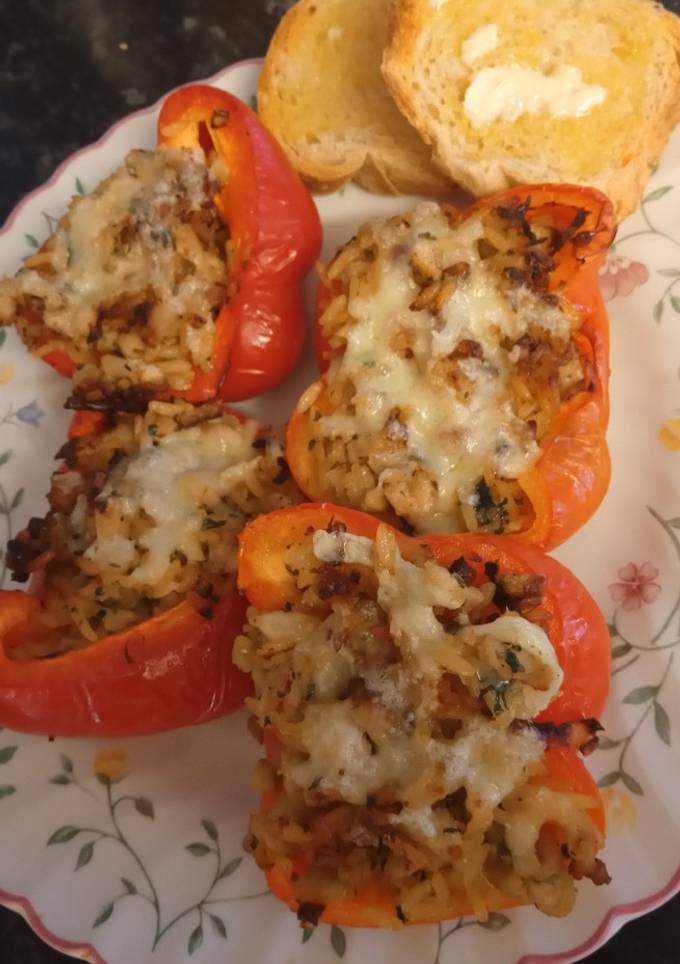 A picture of Air Fryer Chicken and rice stuffed bell peppers.