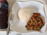 A picture of Coconut rice & vegetable sauce.