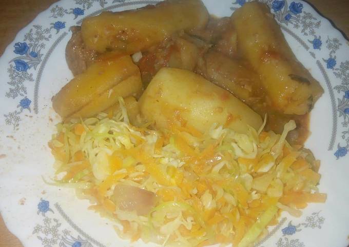 A picture of Matoke with steamed cabbage.