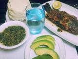 A picture of Fish with creamy kienyeji veges and ugali.