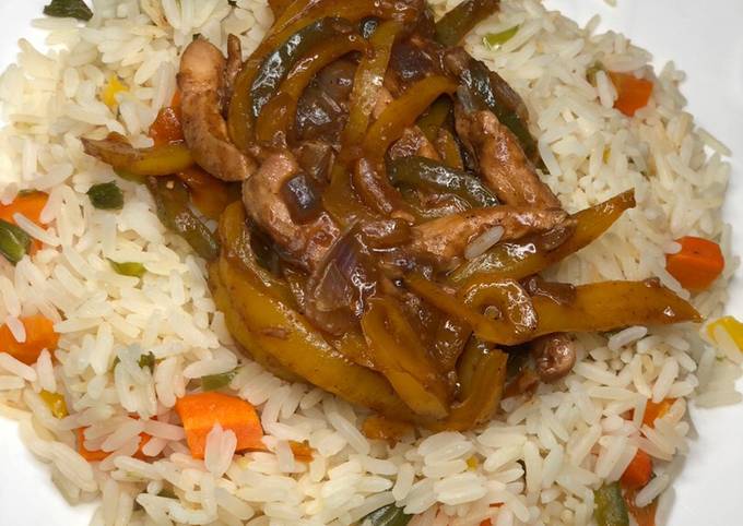 A picture of Vegetable rice and chicken stir fry.