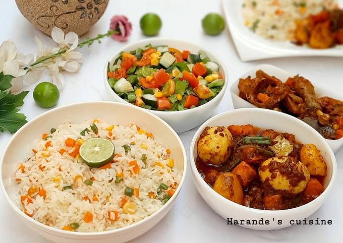 A picture of Lemon veg rice with potato carrot soup.