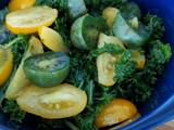 A picture of Raw kale, tomato and kiwiberry salad.