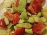 A picture of Cucumber,tomato,avocado salad.