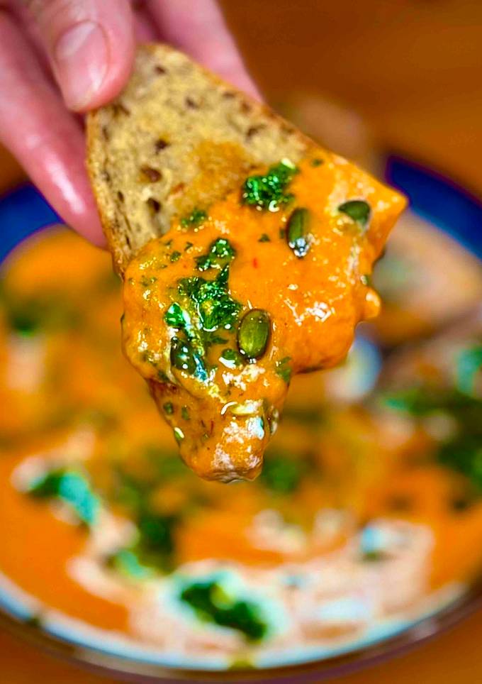 A picture of Creamy Pumpkin Soup with Chimichurri and Sourdough Croutons: The Ultimate Comfort Dish by TastyPinch.