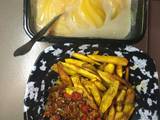 A picture of Sweet fried potatoe with sauce and pap 😋😋.
