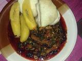 A picture of Boil yam and plantain with vegetable sauce.