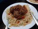 A picture of Spaghetti & Meat Balls in tomato sauce.