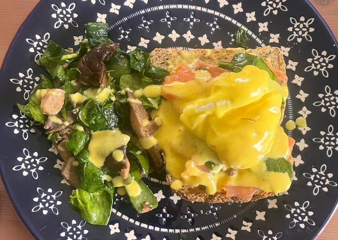 A picture of The perfect homemade Eggs Royale + hollandaise + mushroom and spinach.