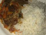 A picture of Rice with vegetable soup & orisirisi.